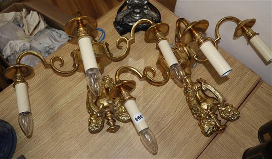 A pair of gilt brass/ormolu baroque style three-light wall sconces